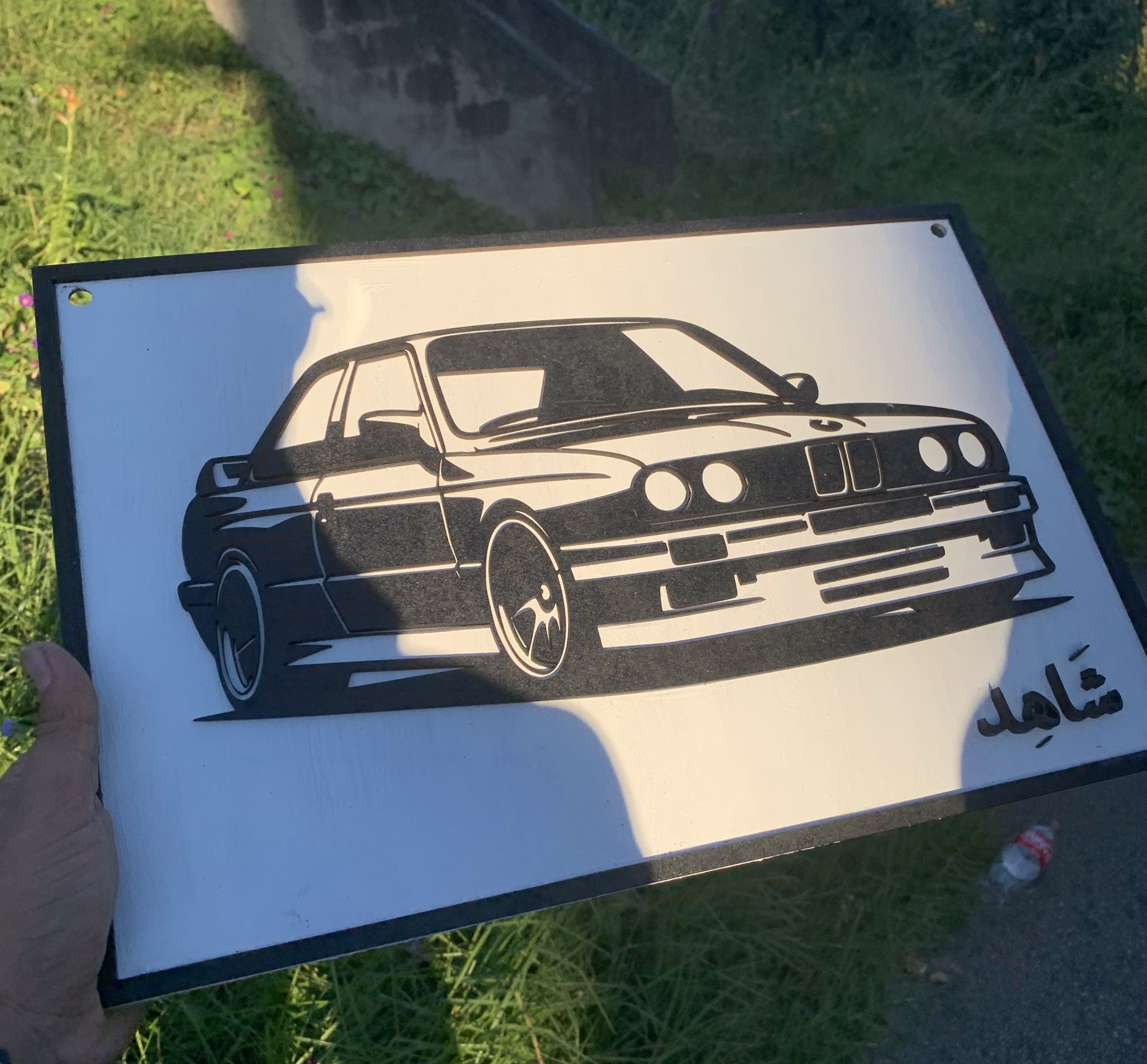 Black and white custom car wall art with Arabic name detail